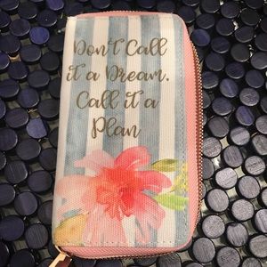 Brand new Cell phone and credit card wristlet.